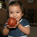  Maya loved playing with the wooden spheres that Dave makes. 